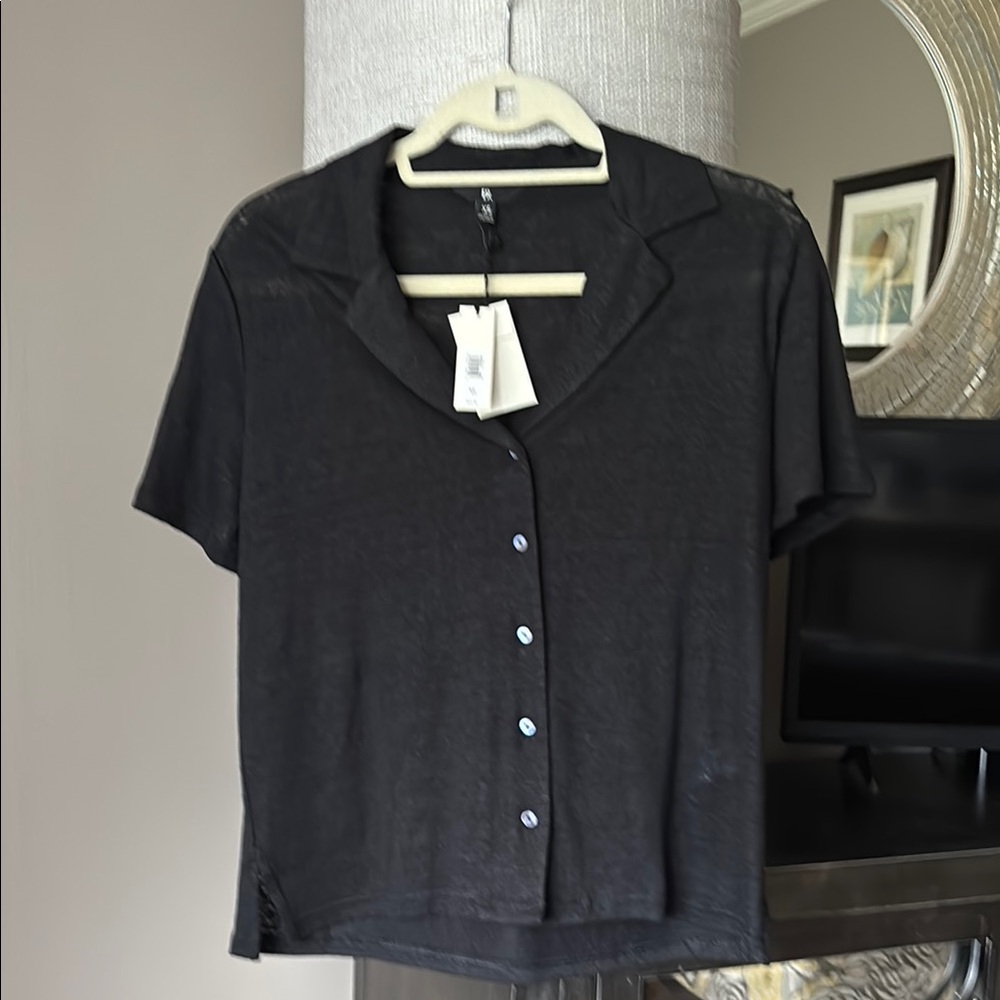 Black Button-Up Women's Top never worn. XS but fits like a medium